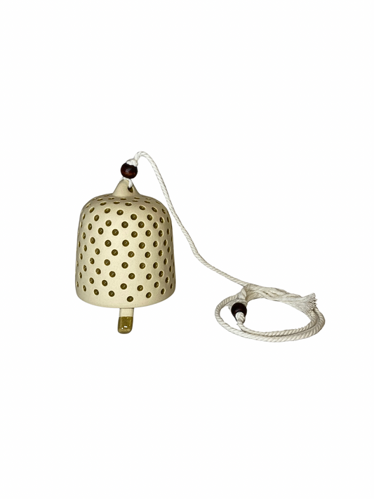 Cream polka dot bell size M