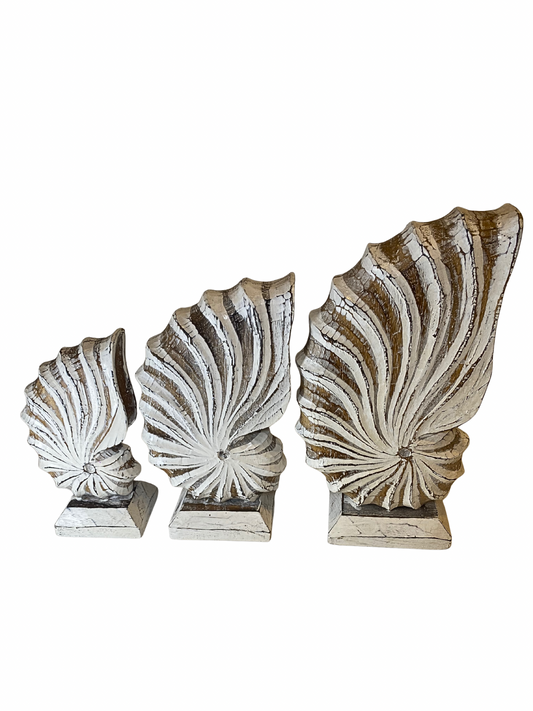 Wooden nautilus shell statues
